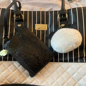 Black and white striped Betsey Johnson. Includes key chain and coin purse. NWOT